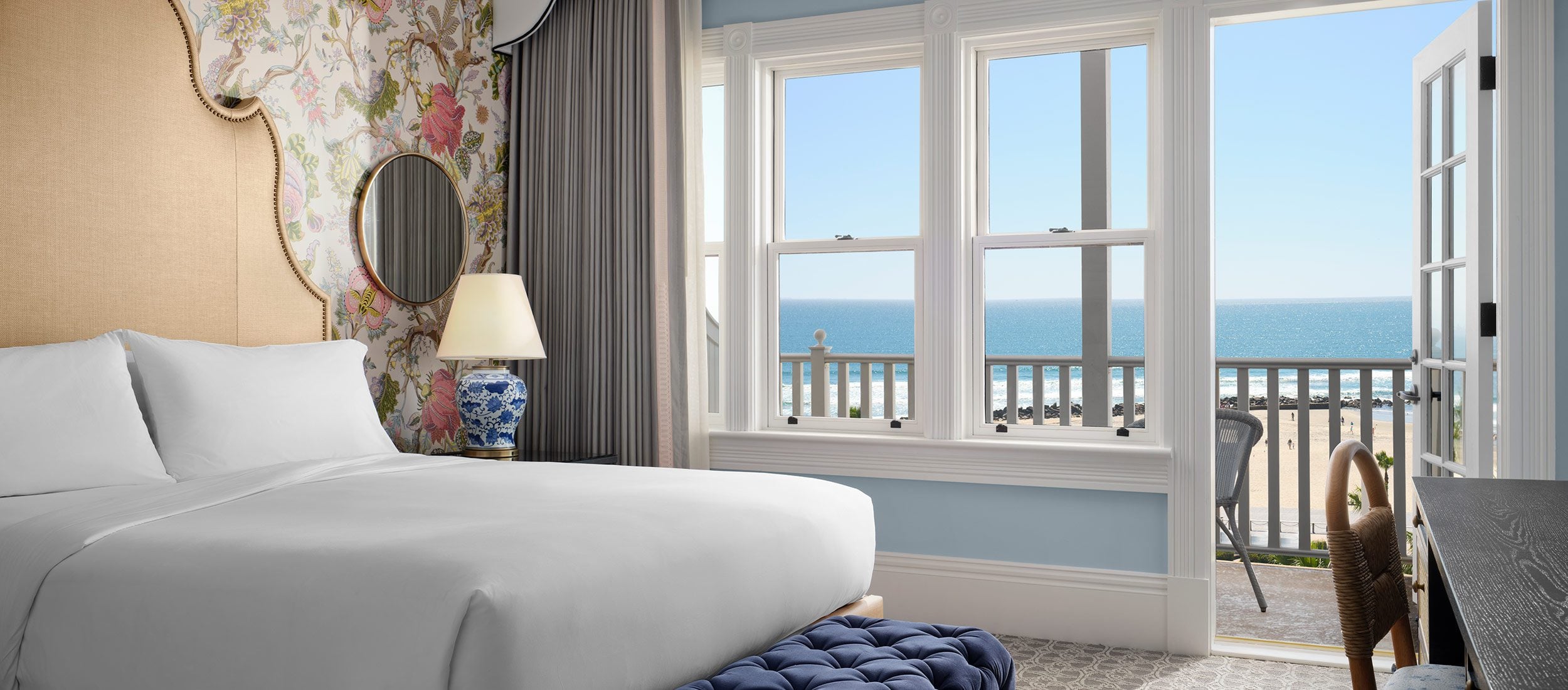 Oceanfront Victorian guest room with king bed and balcony